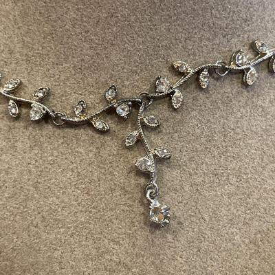 Purple bead and ivy design necklaces