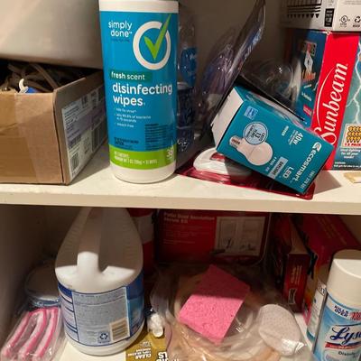 White cabinet full of cleaners