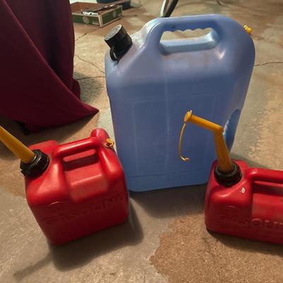 Water cans and 2 gas cans