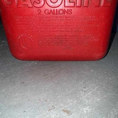 Water cans and 2 gas cans