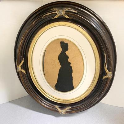 Woman’s Silouette In Antique Frame