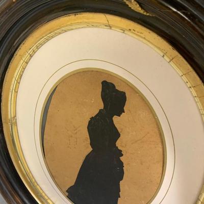Woman’s Silouette In Antique Frame