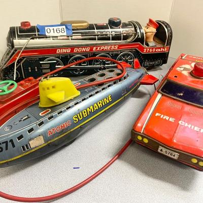 THREE Vintage Battery Operated Toys Atomic Sub Fire Chief Ding Dong Express