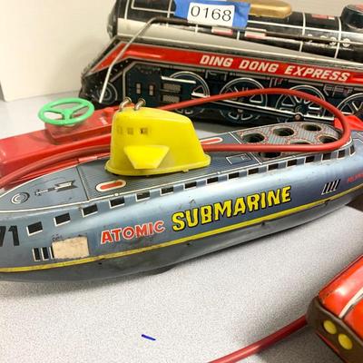THREE Vintage Battery Operated Toys Atomic Sub Fire Chief Ding Dong Express