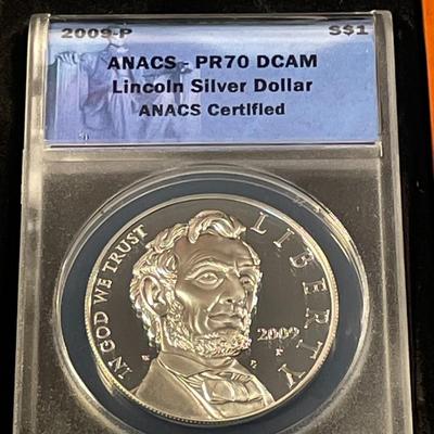 ANACS CERTIFIED 2009-P PROOF-70 DEEP CAMEO LINCOLN COMMEORATIVE SILVER DOLLAR IN A CHERRY WOOD CUSTOM WINDOW BOX.