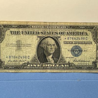 Series of 1957 Heavily Circulated Condition Star Note Silver Certificate as Pictured. FREE DOMESTIC SHIPPING.