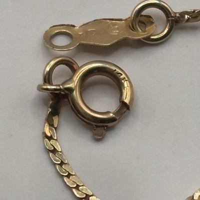 Lot 509J: 14K Gold Chain & 14K Heart Charm Tw 1.34g