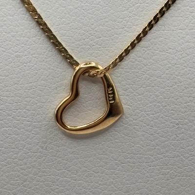 Lot 509J: 14K Gold Chain & 14K Heart Charm Tw 1.34g