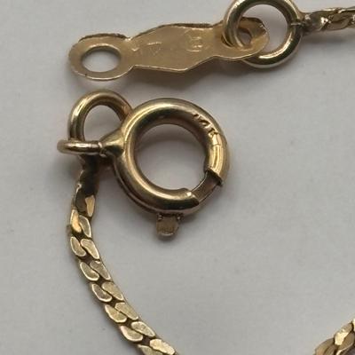 Lot 509J: 14K Gold Chain & 14K Heart Charm Tw 1.34g
