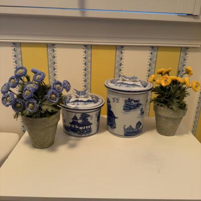 433 Two Blue and White Canisters with Artificial Flowers