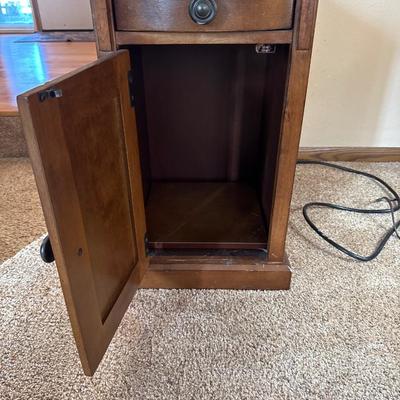 Wooden side table with outlets