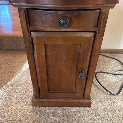 Wooden side table with outlets