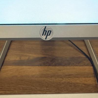 Wooden desk, chair Dell desktop computer with HP Monitor