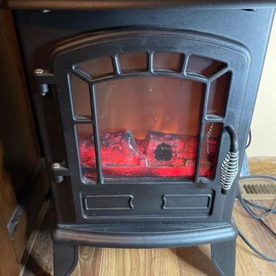 Small wood stove style heater