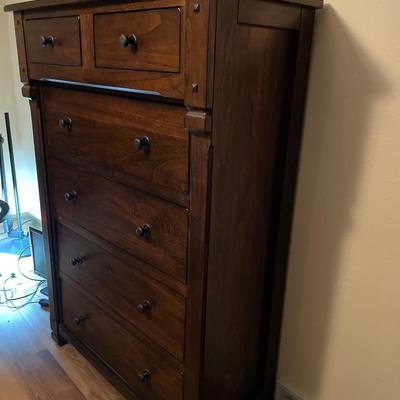 Dark wood tall boy dresser