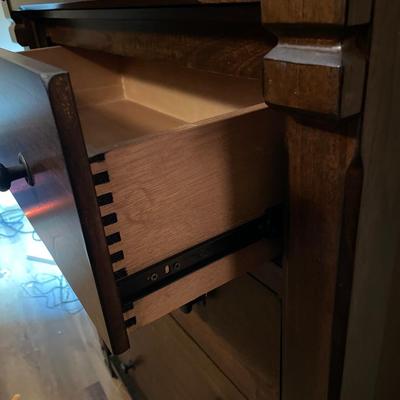 Dark wood tall boy dresser