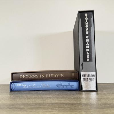 LOT 8L: Folio Society Books - 2007 Blackmailers Don't Shoot by Raymond Chandler, 2010 Dickens in Europe & 2009 The Wit of Oscar...