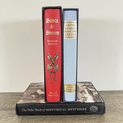 LOT 12L: Folio Society Books - 2009 Saints & Sinners by Eamon Duffy, 2009 Crime Stories from the 'Strand' & 2008 The...