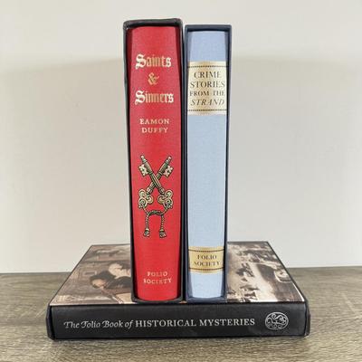 LOT 12L: Folio Society Books - 2009 Saints & Sinners by Eamon Duffy, 2009 Crime Stories from the 'Strand' & 2008 The...