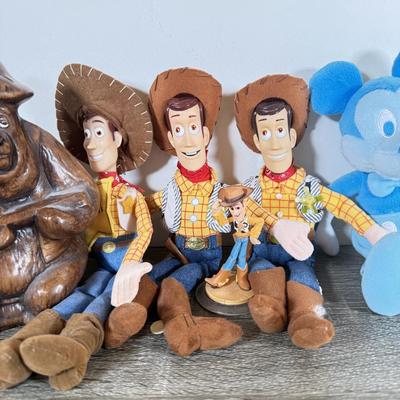 LOT 45L: Disney Collection - 1970s Big Al Coin Bank, Woody Dolls, Hallmark Haunted Mansion Hitch Hiking Ghosts & More