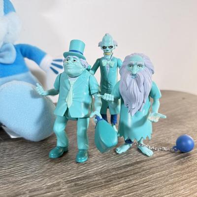 LOT 45L: Disney Collection - 1970s Big Al Coin Bank, Woody Dolls, Hallmark Haunted Mansion Hitch Hiking Ghosts & More