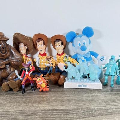 LOT 45L: Disney Collection - 1970s Big Al Coin Bank, Woody Dolls, Hallmark Haunted Mansion Hitch Hiking Ghosts & More