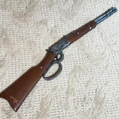 LOT 46L: 2013 Bradford Exchange "True Grit" Commemorative Rifle A0011, 2019 John Wayne: Western Icon Masterpiece Wall Decor...