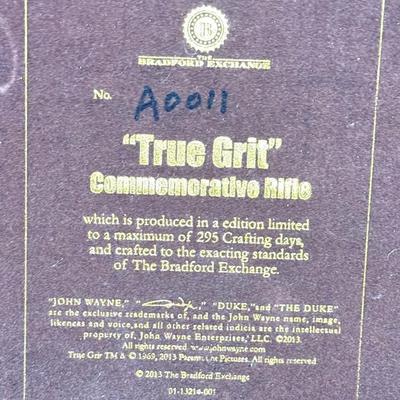 LOT 46L: 2013 Bradford Exchange "True Grit" Commemorative Rifle A0011, 2019 John Wayne: Western Icon Masterpiece Wall Decor...