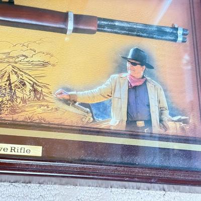 LOT 46L: 2013 Bradford Exchange "True Grit" Commemorative Rifle A0011, 2019 John Wayne: Western Icon Masterpiece Wall Decor...