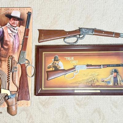 LOT 46L: 2013 Bradford Exchange "True Grit" Commemorative Rifle A0011, 2019 John Wayne: Western Icon Masterpiece Wall Decor...