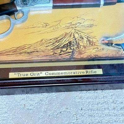 LOT 46L: 2013 Bradford Exchange "True Grit" Commemorative Rifle A0011, 2019 John Wayne: Western Icon Masterpiece Wall Decor...