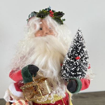 LOT 55M: Byer's Choice - 2012 Santa w/ Toys, 2006 Fireplace w/ Music Stand & A Christmas Carol Puzzle