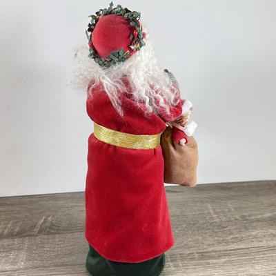 LOT 55M: Byer's Choice - 2012 Santa w/ Toys, 2006 Fireplace w/ Music Stand & A Christmas Carol Puzzle