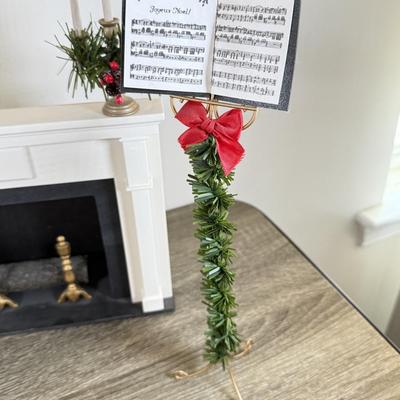 LOT 55M: Byer's Choice - 2012 Santa w/ Toys, 2006 Fireplace w/ Music Stand & A Christmas Carol Puzzle