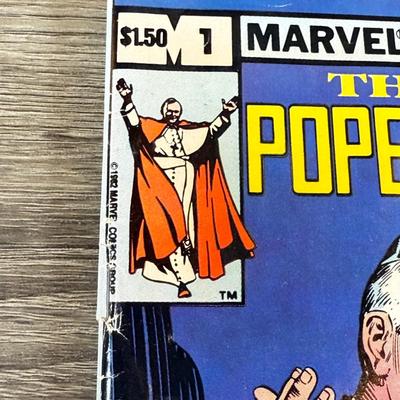LOT 60M: 1982 Marvel Comics The Life of Pope John Paul II w/ Collection of Books on Historical & Modern Popes and the Vatican