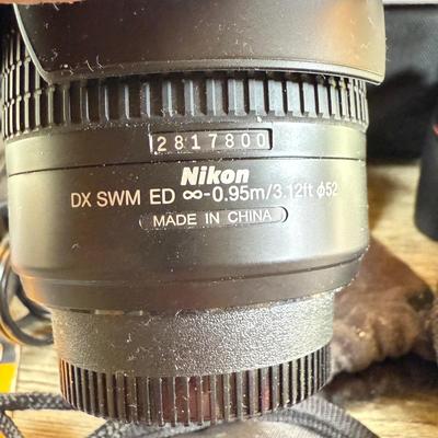 LOT 65M: Nikon D3000 DSLR Camera w/ Lenses & Accessories