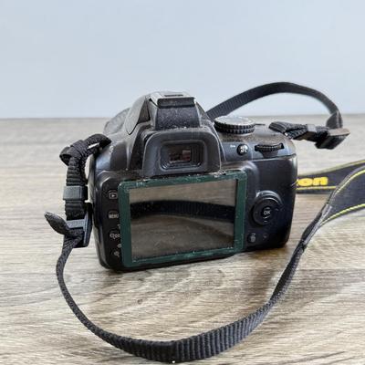LOT 65M: Nikon D3000 DSLR Camera w/ Lenses & Accessories