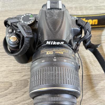LOT 65M: Nikon D3000 DSLR Camera w/ Lenses & Accessories