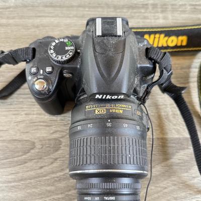 LOT 65M: Nikon D3000 DSLR Camera w/ Lenses & Accessories