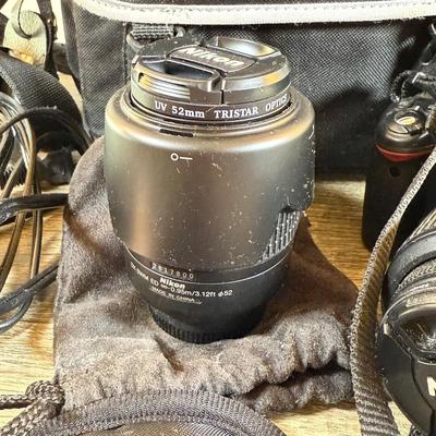 LOT 65M: Nikon D3000 DSLR Camera w/ Lenses & Accessories