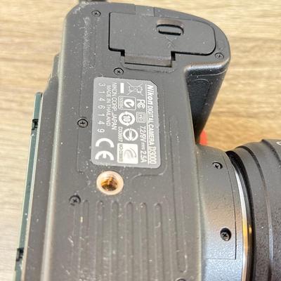 LOT 65M: Nikon D3000 DSLR Camera w/ Lenses & Accessories