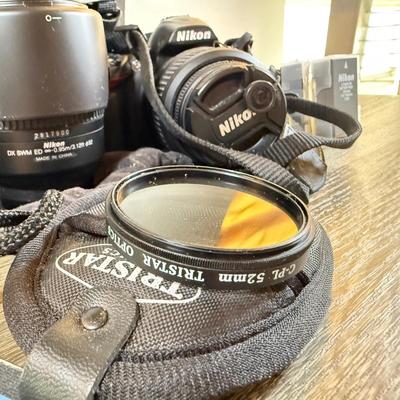 LOT 65M: Nikon D3000 DSLR Camera w/ Lenses & Accessories
