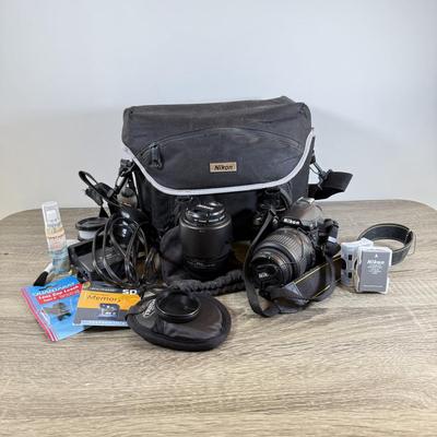 LOT 65M: Nikon D3000 DSLR Camera w/ Lenses & Accessories