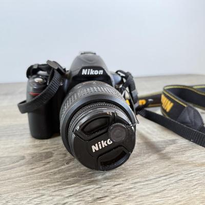 LOT 65M: Nikon D3000 DSLR Camera w/ Lenses & Accessories