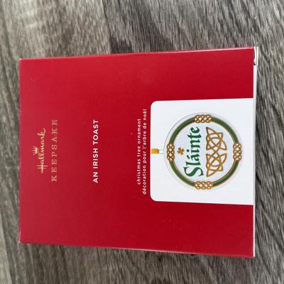 LOT 74M: Ireland Nyl-Glo Flag, Fitzgerald's Irish Turf, Hallmark Keepsake Ornaments w/ Boxes, Irish / Celtic Music CDs & More