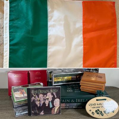LOT 74M: Ireland Nyl-Glo Flag, Fitzgerald's Irish Turf, Hallmark Keepsake Ornaments w/ Boxes, Irish / Celtic Music CDs & More