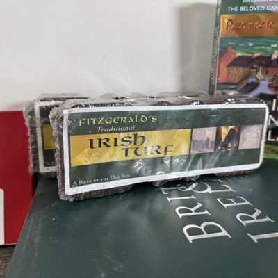 LOT 74M: Ireland Nyl-Glo Flag, Fitzgerald's Irish Turf, Hallmark Keepsake Ornaments w/ Boxes, Irish / Celtic Music CDs & More