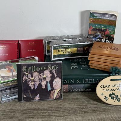 LOT 74M: Ireland Nyl-Glo Flag, Fitzgerald's Irish Turf, Hallmark Keepsake Ornaments w/ Boxes, Irish / Celtic Music CDs & More