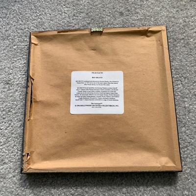 LOT 92 M: Framed John Wayne Collection: First Day Issue Stagecoach Stamp, Limited Edition Film Cells, Rio Bravo "Dynamite"...