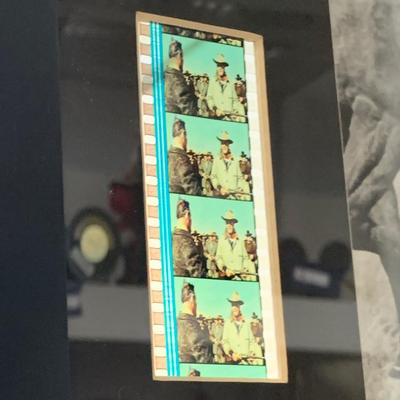 LOT 92 M: Framed John Wayne Collection: First Day Issue Stagecoach Stamp, Limited Edition Film Cells, Rio Bravo "Dynamite"...